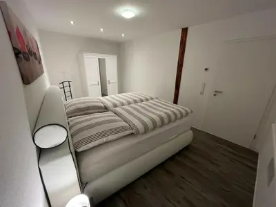 Ein Bett oder Betten in einem Zimmer der Unterkunft Am Jacobsgarten Comfortable holiday residence