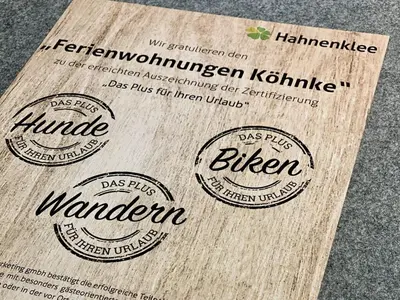 Ein Zertifikat, Auszeichnung, Logo oder anderes Dokument, das in der Unterkunft Köhnke 1 Comfortable holiday residence ausgestellt ist