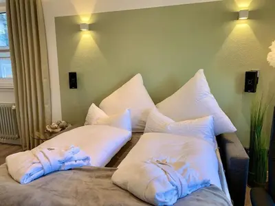 Ein Bett oder Betten in einem Zimmer der Unterkunft Ferienwohnung Köhnke 2