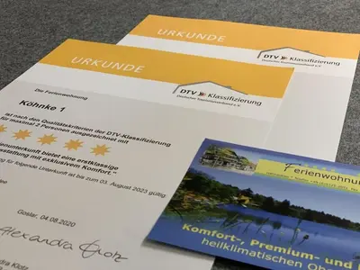 Ein Zertifikat, Auszeichnung, Logo oder anderes Dokument, das in der Unterkunft Köhnke 6 Comfortable holiday residence ausgestellt ist