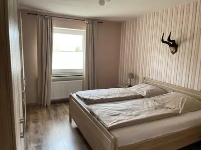 Ein Bett oder Betten in einem Zimmer der Unterkunft Fewo-Grane