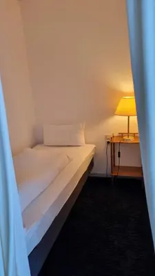 Ein Bett oder Betten in einem Zimmer der Unterkunft Ferienwohnung Dorna