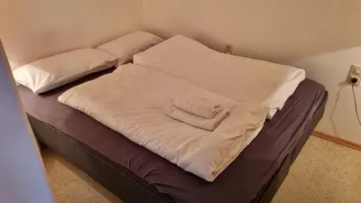 Ein Bett oder Betten in einem Zimmer der Unterkunft Ferienwohnung Dorna