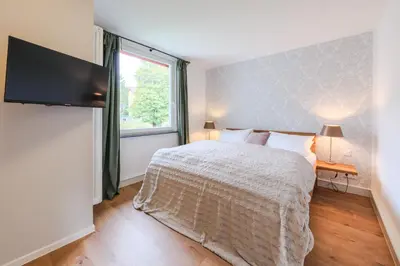 Ein Bett oder Betten in einem Zimmer der Unterkunft Garten 5