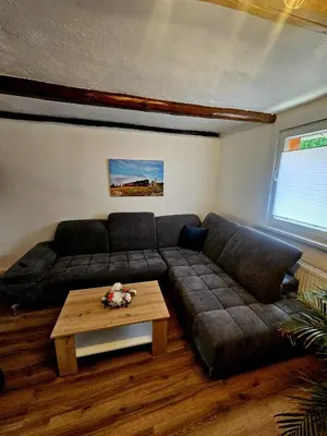 Ein Sitzbereich in der Unterkunft Ferienhaus zu den Ilsefällen