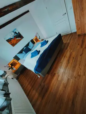 Ein Bett oder Betten in einem Zimmer der Unterkunft Ferienhaus zu den Ilsefällen