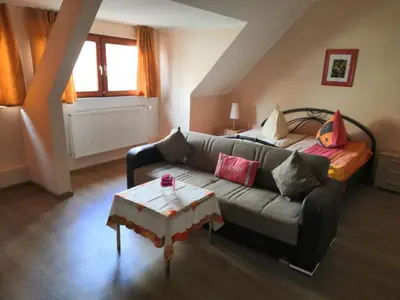 Ein Sitzbereich in der Unterkunft Hotel und Gaststätte Bierstübchen