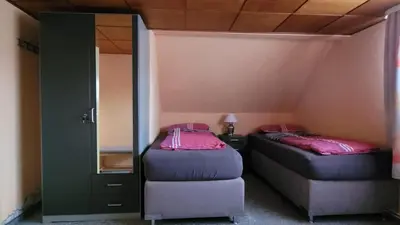 Ein Bett oder Betten in einem Zimmer der Unterkunft Sommerflieder