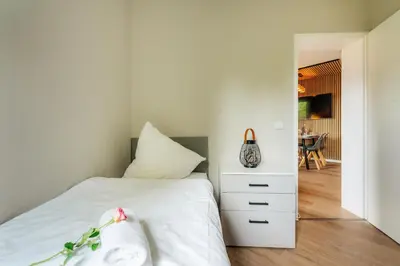 Ein Bett oder Betten in einem Zimmer der Unterkunft Harzglanz FeWo's Ariadel in Braunlage