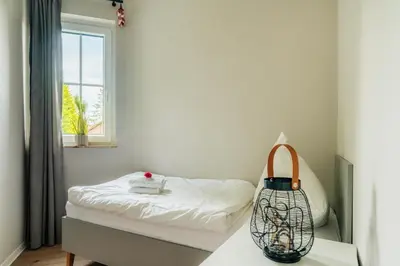 Ein Bett oder Betten in einem Zimmer der Unterkunft Harzglanz FeWo's Ariadel in Braunlage