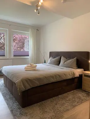 Ein Bett oder Betten in einem Zimmer der Unterkunft Ferienwohnung in Marktnähe 96 qm