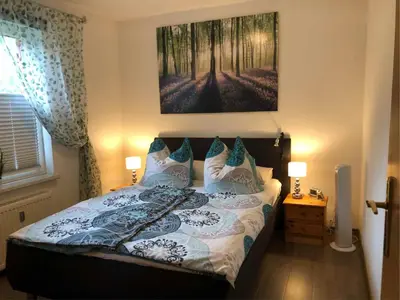 Ein Bett oder Betten in einem Zimmer der Unterkunft Ferienhaus Am Eichenberg Haus 3