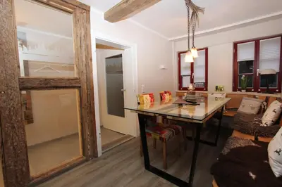 Ein Sitzbereich in der Unterkunft Ferienhaus Charlotte