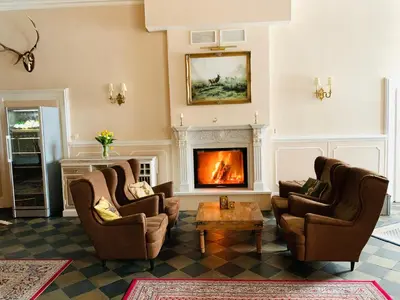 Ein Sitzbereich in der Unterkunft Jagdschloss Walkenried - Hotel Residenz