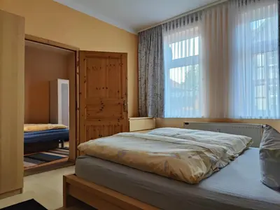 Ein Bett oder Betten in einem Zimmer der Unterkunft Ferienwohnung Rustica