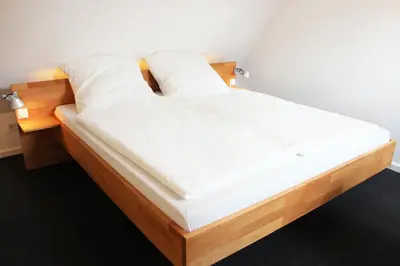 Ein Bett oder Betten in einem Zimmer der Unterkunft Studio Karl Oppermann mit Einzelgarage