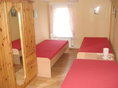 Ein Bett oder Betten in einem Zimmer der Unterkunft Ferienwohnungen Pook