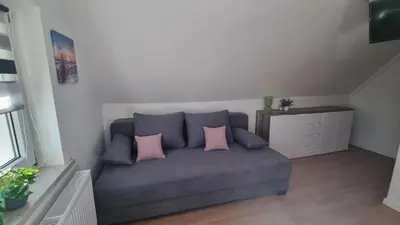 Ein Sitzbereich in der Unterkunft Ferienhaus im Amselweg - Sauna & Garten