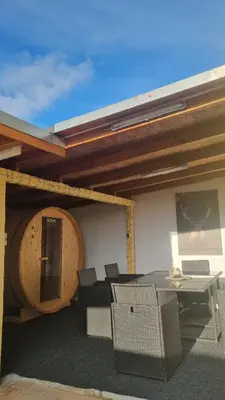 Ein Sitzbereich in der Unterkunft Ferienhaus im Amselweg - Sauna & Garten
