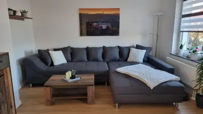 Ein Sitzbereich in der Unterkunft Ferienhaus im Amselweg - Sauna & Garten
