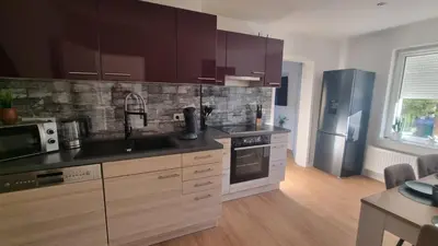 Küche/Küchenzeile in der Unterkunft Ferienhaus im Amselweg - Sauna & Garten