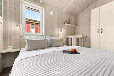 Ein Bett oder Betten in einem Zimmer der Unterkunft Ferienhaus HarzZauber Lodge - Sankt Andreasberg im Harz