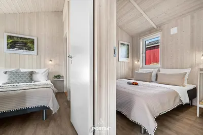 Ein Bett oder Betten in einem Zimmer der Unterkunft Ferienhaus HarzZauber Lodge - Sankt Andreasberg im Harz