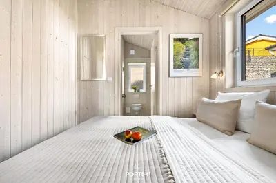 Ein Bett oder Betten in einem Zimmer der Unterkunft Ferienhaus HarzZauber Lodge - Sankt Andreasberg im Harz