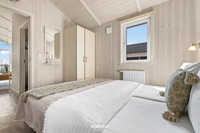 Ein Bett oder Betten in einem Zimmer der Unterkunft Ferienhaus HarzZauber Lodge - Sankt Andreasberg im Harz