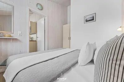 Ein Bett oder Betten in einem Zimmer der Unterkunft Ferienhaus Bergwiesenblick - Sankt Andreasberg im Harz