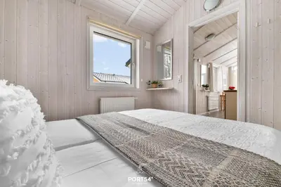 Ein Bett oder Betten in einem Zimmer der Unterkunft Ferienhaus Sonnentau - Sankt Andreasberg im Harz