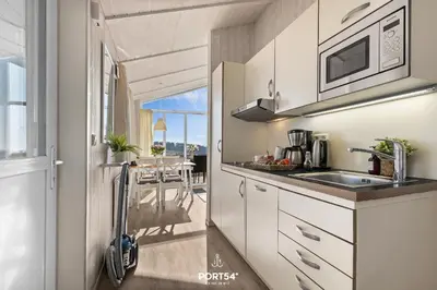 Küche/Küchenzeile in der Unterkunft Ferienhaus Panorama-Lodge 48 - Sankt Andreasberg im Harz