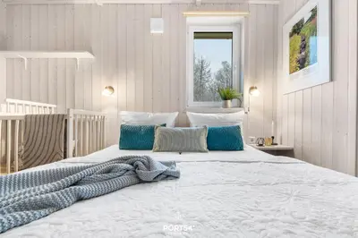 Ein Bett oder Betten in einem Zimmer der Unterkunft Ferienhaus Panoramablick 19 - Sankt Andreasberg im Harz