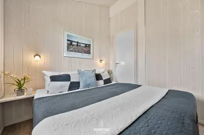 Ein Bett oder Betten in einem Zimmer der Unterkunft Ferienhaus Harter Brocken - Sankt Andreasberg im Harz