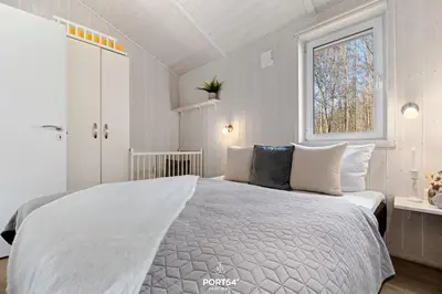 Ein Bett oder Betten in einem Zimmer der Unterkunft Ferienhaus Panoramablick 18 - Sankt Andreasberg im Harz