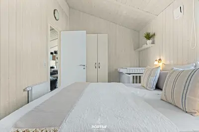 Ein Bett oder Betten in einem Zimmer der Unterkunft Ferienhaus Harzliebe - Sankt Andreasberg im Harz