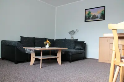 Ein Sitzbereich in der Unterkunft Ferienwohnungen Grüne Tanne