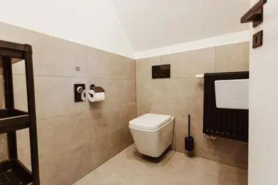 Ein Badezimmer in der Unterkunft Harzchalet Brockenbahn 2A