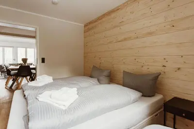 Ein Bett oder Betten in einem Zimmer der Unterkunft Harzchalet Brockenbahn 2A