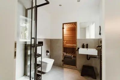 Ein Badezimmer in der Unterkunft Harzchalet Brockenbahn 2A