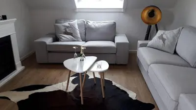 Ein Sitzbereich in der Unterkunft Herzchalet Carl