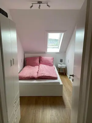 Ein Bett oder Betten in einem Zimmer der Unterkunft Herzchalet Carl