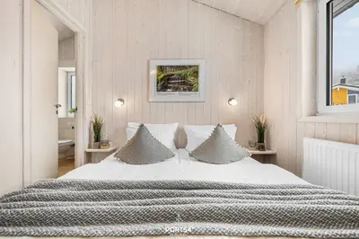 Ein Bett oder Betten in einem Zimmer der Unterkunft Ferienhaus Bergnest - Sankt Andreasberg im Harz