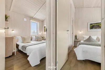 Ein Bett oder Betten in einem Zimmer der Unterkunft Ferienhaus Bergnest - Sankt Andreasberg im Harz