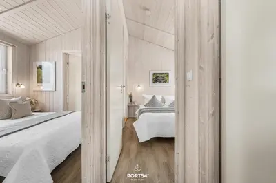 Ein Bett oder Betten in einem Zimmer der Unterkunft Ferienhaus Bergnest - Sankt Andreasberg im Harz