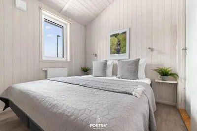 Ein Bett oder Betten in einem Zimmer der Unterkunft Ferienhaus Harzblick - Sankt Andreasberg im Harz