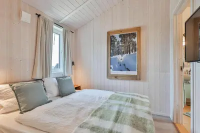 Ein Bett oder Betten in einem Zimmer der Unterkunft Ferienhaus Silberhütte - Sankt Andreasberg im Harz