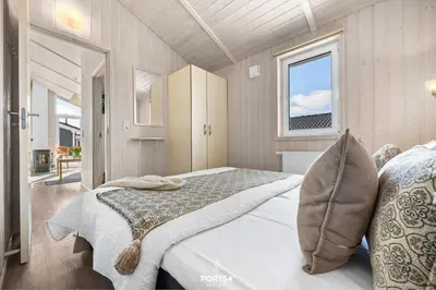 Ein Bett oder Betten in einem Zimmer der Unterkunft Ferienhaus Panoramablick 26 - Sankt Andreasberg im Harz