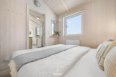 Ein Bett oder Betten in einem Zimmer der Unterkunft Ferienhaus Harzer Nest - Sankt Andreasberg im Harz