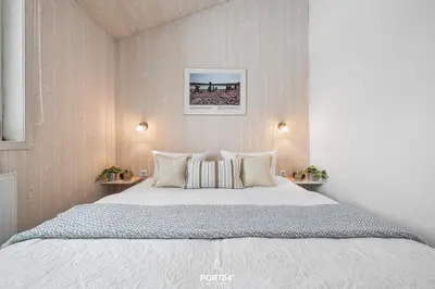 Ein Bett oder Betten in einem Zimmer der Unterkunft Ferienhaus Harzer Nest - Sankt Andreasberg im Harz